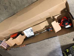 lot 26 image: ECHO 10 in. 21.2 cc Gas 2-Stroke Power Pole Saw with 94 in. Shaft  Customer Returns See Pictures