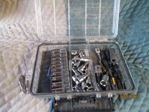 lot 53 image: Husky 11 storage bin with an  assortment of accessories
