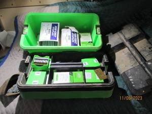 lot 88 image: Green toolbox loaded with staples