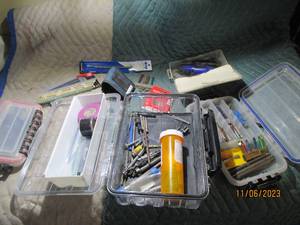 lot 98 image: chainsaw sharpener, screwdriver bits and other accessories