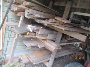 lot 128 image: All wood on wood racking under deck.