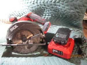 lot 170 image: Cordless Skil circular saw