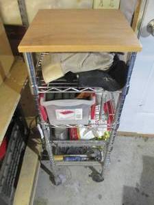 lot 310 image: Metal cart on wheels with contents