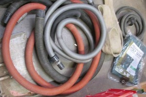 lot 318 image: Lot of vacuum hoses, a tow strap plus