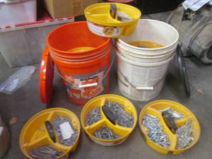 lot 9 image: bucket organizers full of assorted nails, nuts and bolts etc