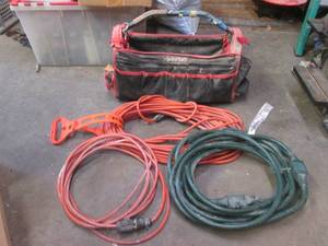 lot 20 image: 3 extension cords in a Husky tool bag