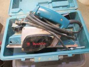 lot 204 image: Makita electric planer