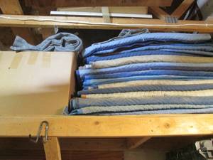 lot 228 image: Large box and stack of moving blankets