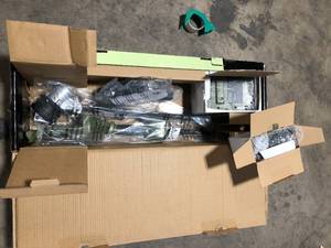 lot 7 image: Green Machine 62V 16 in. Cordless Carbon Fiber Shaft String Trimmer Brushless motor and Auto-Wind spool with 2.5AH Battery and Charger Customer Returns See Pictures