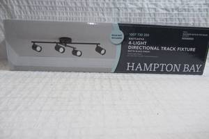 lot 141 image: Hampton Bay Eastcastle 4 Light Directional Track Fixture Matte Black Finish
