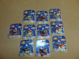 lot 31 image: 10 Pack Jurassic World Uncaged Wild Pop Ups Fire Dinosaur Toy