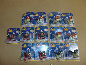 lot 137 image: 13 Pack Jurassic World Uncaged Wild Pop Ups Fire Dinosaur Toy 194735042883