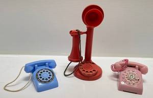 lot 18 image: 1950s - 60s Childs Telephone Toys Candle Stick Phone Is A Bank (Pink Phone Is A Music Box)