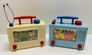 lot 31 image: 2 1060s Teach-A-Tot Tune-A-Vision Toys
