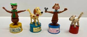 lot 71 image: 1960s Push Button Puppets Including Yogi Bear, Jinks & More