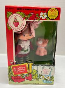 lot 81 image: 1982 Strawberry Shortcake Doll WCustard Cat & Comb (NEW IN BOX)