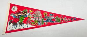 lot 294 image: Vintage 1989 50 Anniversary Nintendo Super Mario Bros.  Ice Capades Pennant (Date Written On Bottom)
