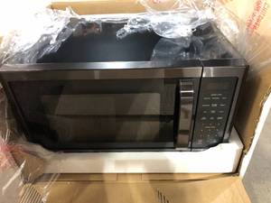 Magic Chef 0.9 cu. ft. 900-Watt Countertop Microwave in Stainless Steel  Customer Returns See Pictures