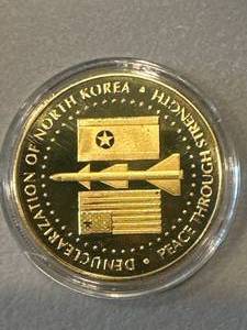 lot 16 image: Trump Kim Jung Un Coin
