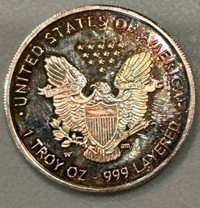 lot 23 image: 2010 Silver American Eagle Layer in .999 Silver