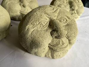 lot 314 image: Four Fun Facial Expressions Garden Stones