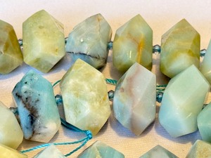 lot 186 image: Strand of Cloudy Amazoni Beads