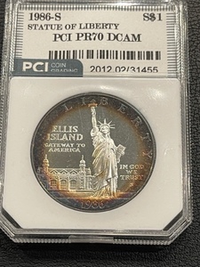lot 10 image: 1986-S Statue of Liberty Dollar PCI PR70 Deep Cameo Proof with Toning