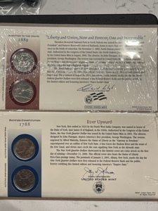 lot 58 image: North Dakota and New York P&D State Quarters Uncirculated