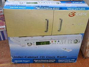 lot 341 image: GPX Undercabinet CD Clock Radio (in original packaging)