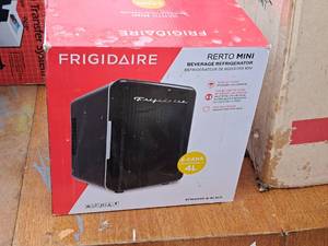lot 344 image: Frigidaire 6-can Mini Beverage Refrigerator (in original packaging)