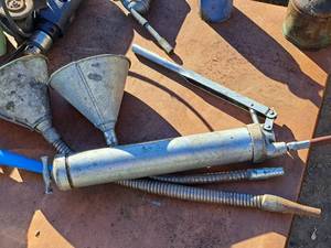 lot 338 image: (2) Metal Funnels, Grease Gun