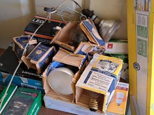 lot 542 image: Lot of  Assorted Light Bulbs (in original packaging) - GE Lamps, Ecosmart LED, Flood Lamps, Clamp Lamp, Compact Fluorescent, 100W Soft White Bulbs