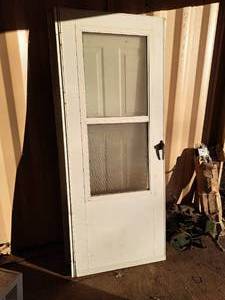 lot 574 image: Storm Door 31-12x80-12