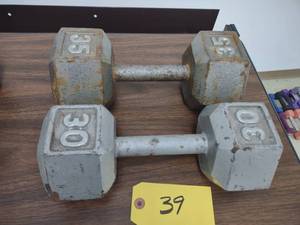 lot 39 image: (1) 35 lb. & (1) 30 lb. Dumbbells...