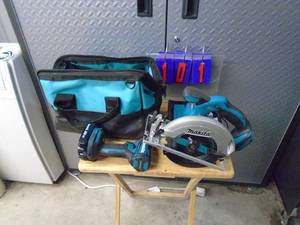 Makita 18 volt driver & saw with 1 battery & charger. Looks like new. As shown.