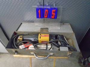 Dayton reciprocating 110 volt saw. Used condition with metal case & blades. As shown.