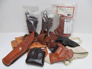 lot 112 image: Great Lot of Leather Pistol Holsters etc