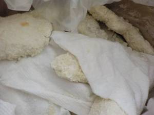 A 10 lb. Boz Frozen Raw Breaded Cod Portions Panko Style