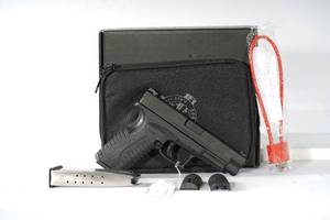 lot 99 image: .45ACP Springfield, XDM, Striker Fired, Semi-automatic, Polymer Frame Pistol, Full Size, 4.5 Barrel, Melonite Finish, Black, Fiber Optic Front Sight and Low Profile Combat Rear Sight, 13 Rounds, 2 Magazines