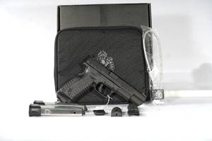 lot 101 image: 9mm Springfield, XDM, Elite Target, Striker Fired, Semi-automatic, Polymer Frame Pistol, Full Size, 5.25 Barrel, Melonite Finish, Black, Fiber Front and Adjustable Rear Sights, 22 Rounds, 3 Magazines