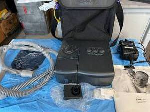 lot 10 image: MSRP $2500 Philips Respironics REMstar Auto With A-Flex CPAP - VPAP Machine With Carrying Bag, Heated Hose, Power Cord, Reservoir, Data Card & Manual Plus Extras (No Mask) - Good Working Condition&nbsp1st Pic Is A Stock Photo