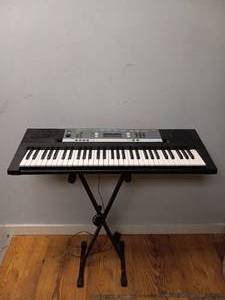 lot 29 image: YAMAHA ELECTRIC KEYBOARD WITH STAND