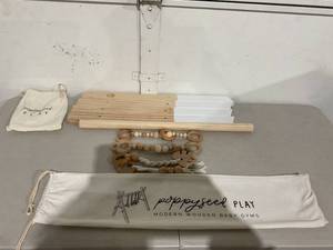 lot 315 image: poppyseed play Natural Wooden Baby Gym