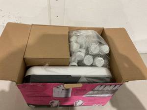lot 326 image: Tommee Tippee Pump & Go Complete Breast Milk Feeding Starter Set