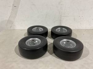 lot 259 image: SET OF 4 - Treadless Tires - 93.50-4