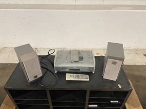 lot 34 image: Five Wooden Storage Cubbies (adjustable shelves) & JVS Compact Disk Player with Speakers and Remote
