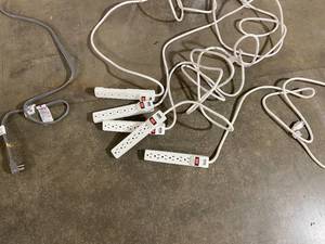 lot 38 image: Five Power Strips and 4 6 Extension Cords