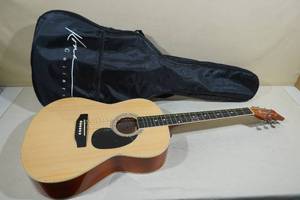 lot 4 image: Kona Acoustic Guitar with Gig Bag