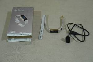 lot 15 image: Fitbit Luxe Fitness and Wellness Tracker