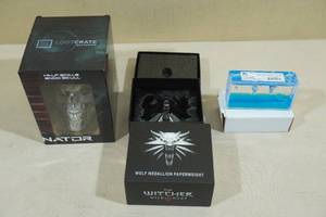 lot 203 image: Assorted Collectables - Witcher Paperweight, Terminator Skull